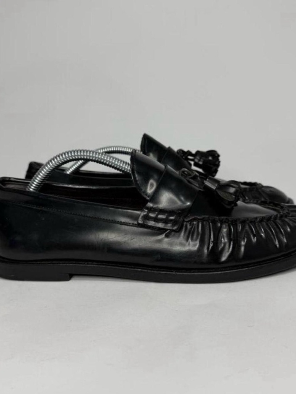 The Row Black Leather Tassel Slip-On Loafers